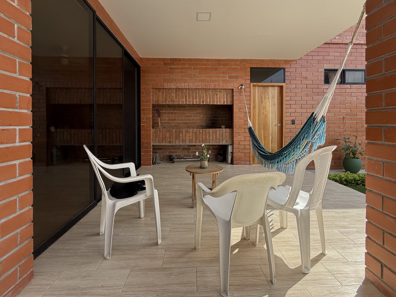 Patio at dusk illuminated with warm lighting